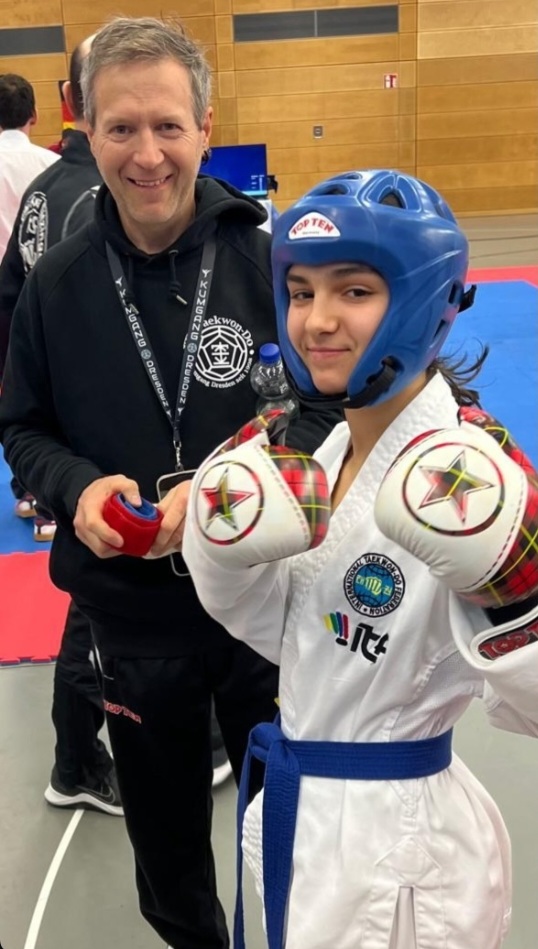 Eine Teilnehmerin und Trainer Frank